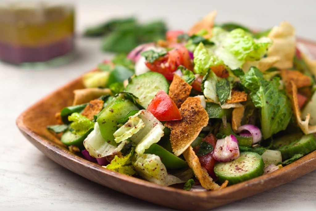 fattoush salad in wooden plate