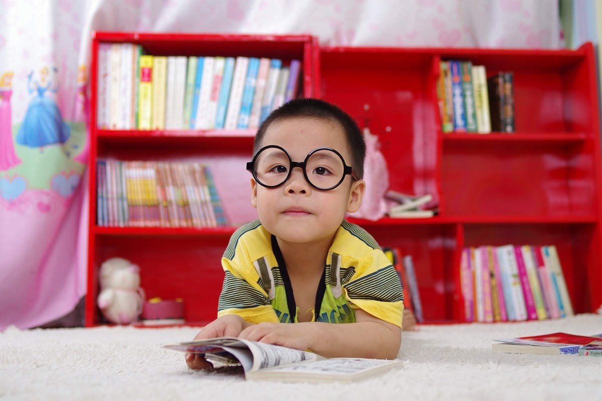 young asian boy with glasses