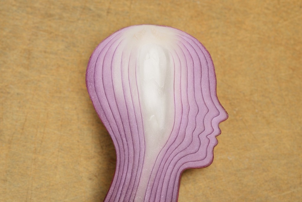 red onion shaped like a female head
