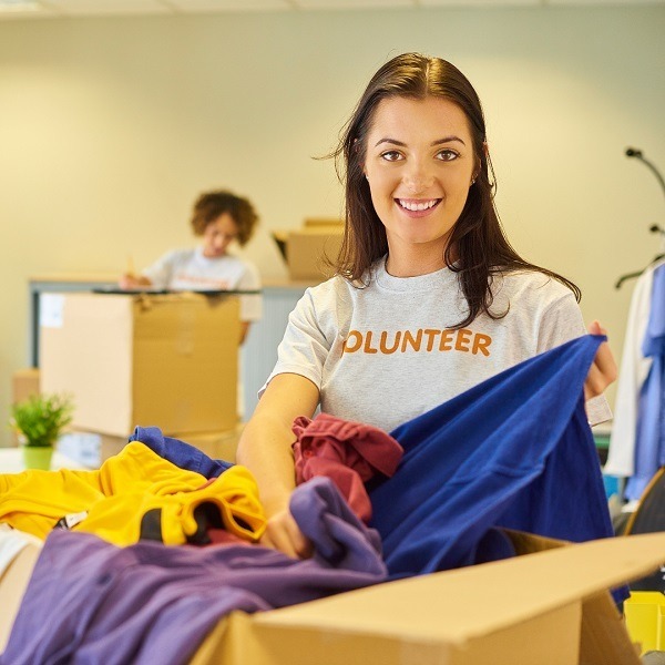 volunteer girl sorting cloths