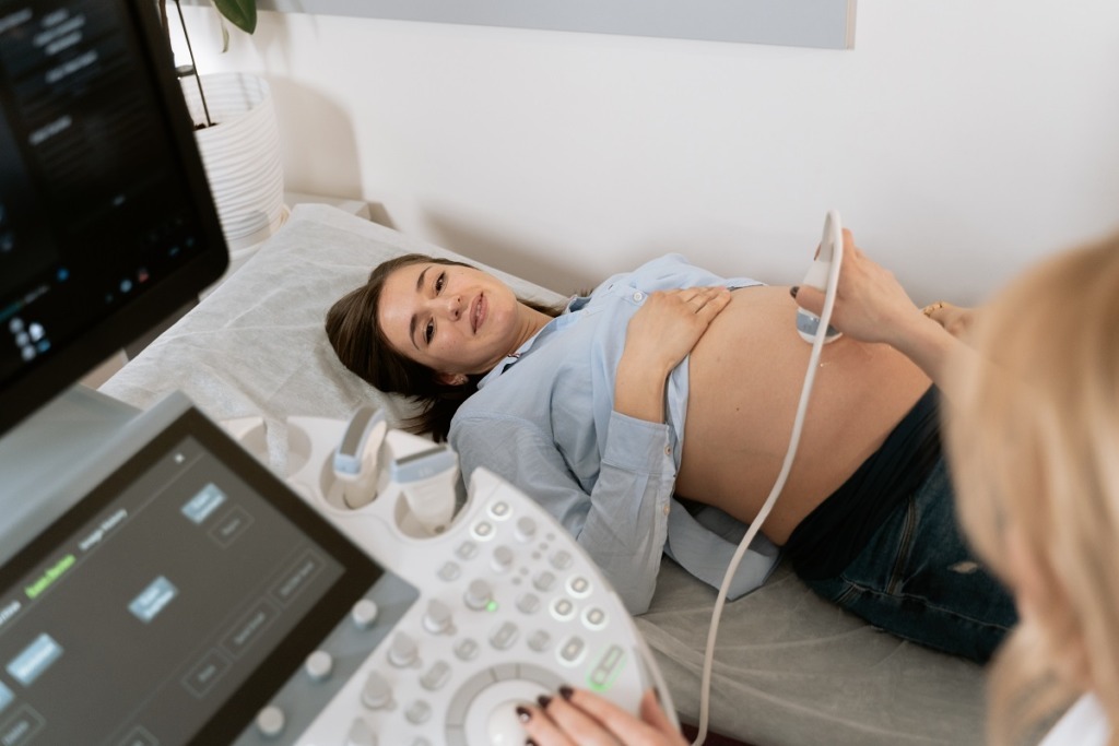 woman receiving ultrasound on belly