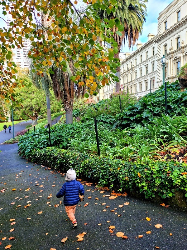 toddler walking in park